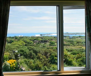 View from bedroom window of Rush Lake House looking out to the sea