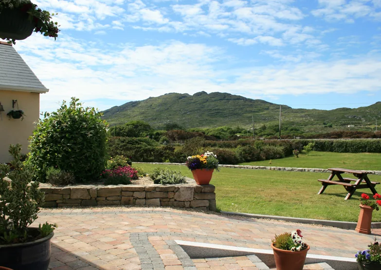 Errisbeg Mountain viewed from the front entrance and patio of Rush Lake House
